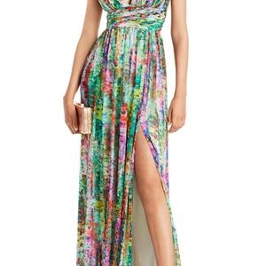 Low cut Aidan Maddox maxi with a slit.